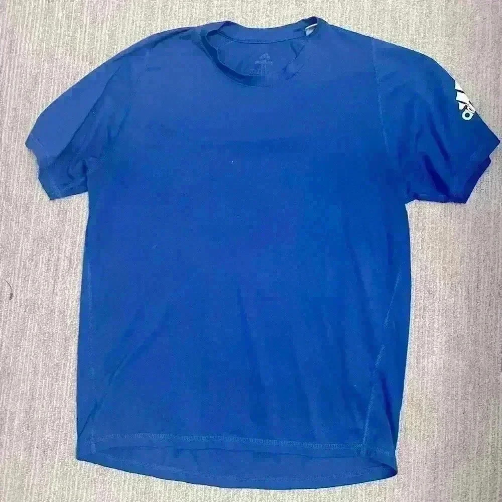 Men's medium blue adidas free lift workout shirt